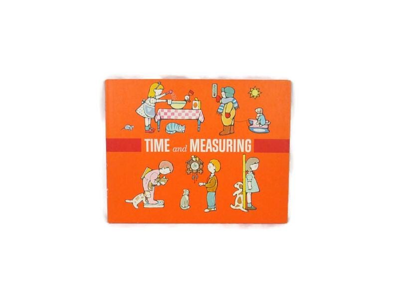 197039s Children39s Time and Measuring Book Vintage Kid39s Hardcover Learning Book Graphic Tee – Everyday Comfort · Perfect For Daily Wear