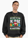 Watching To Nurse is Vintage Retro Be Nice The Christmas Santa Nurse Classic Premium Oversized Sweatshirt